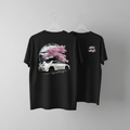 Black t-shirt with cherry blossom and car design on a gray background