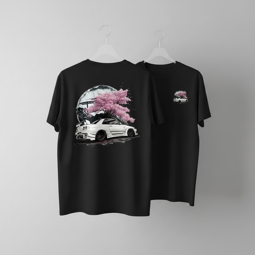 Black t-shirt with cherry blossom and car design on a gray background
