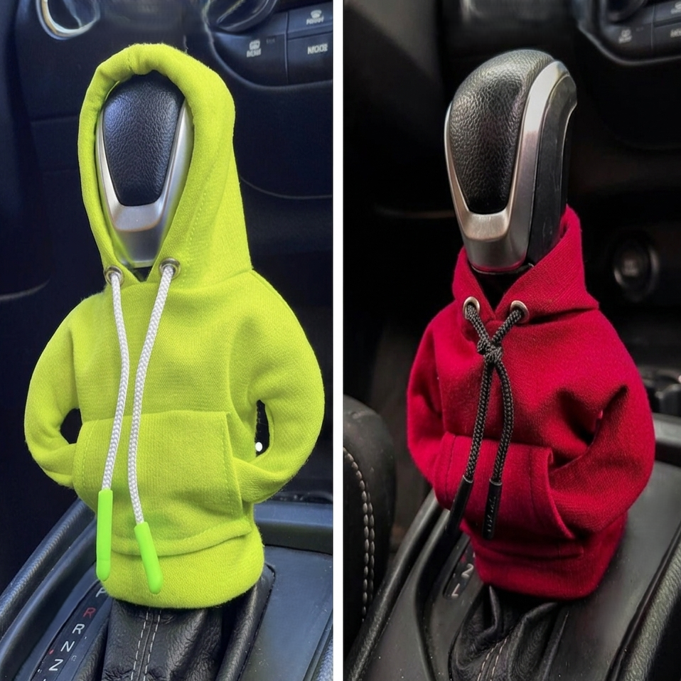 Two car gear shift covers, one lime green and one red, in a vehicle interior.