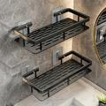 Two black wall-mounted shelves on a bathroom wall with a mirror in the background.
